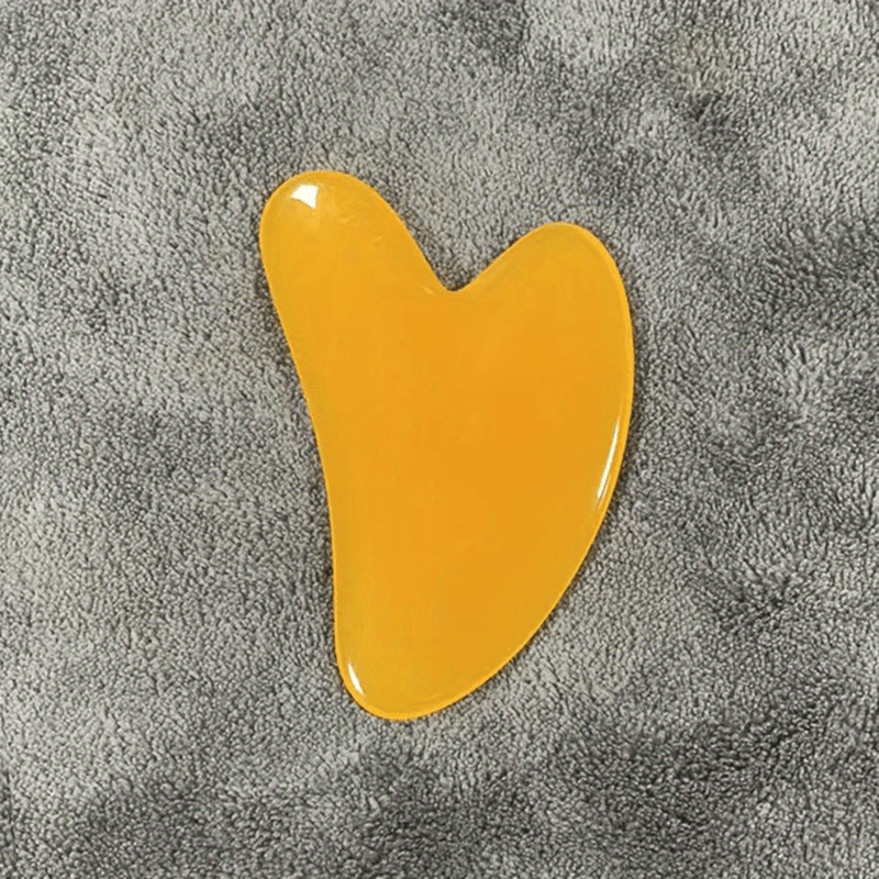 Heart-shaped gua sha facial and body massager