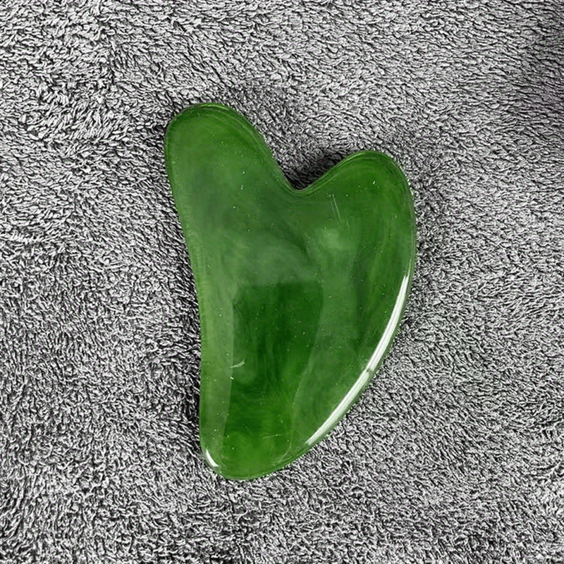 Ergonomic heart-shaped gua sha for skin